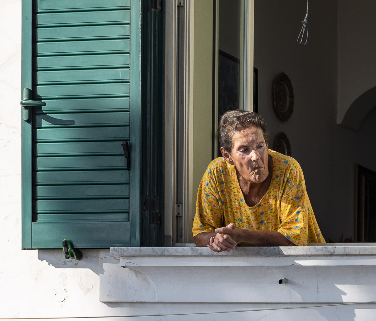Woman in window, Amalfi, Italy